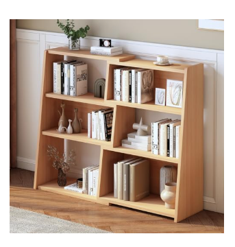 Light wood freestanding bookshelf featuring a unique asymmetric design with staggered open shelves filled with books and modern decor items.