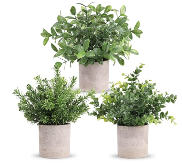 affordable luxury artificial potted plants with various leaf textures in matching grey style pots.