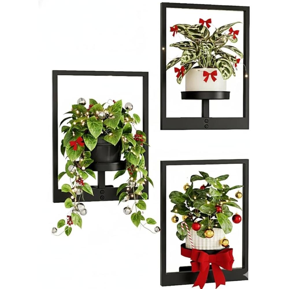 Three black metal rectangular frame wall shelves with integrated plant platforms displaying pothos, prayer plant, and holiday-decorated plants with ornaments