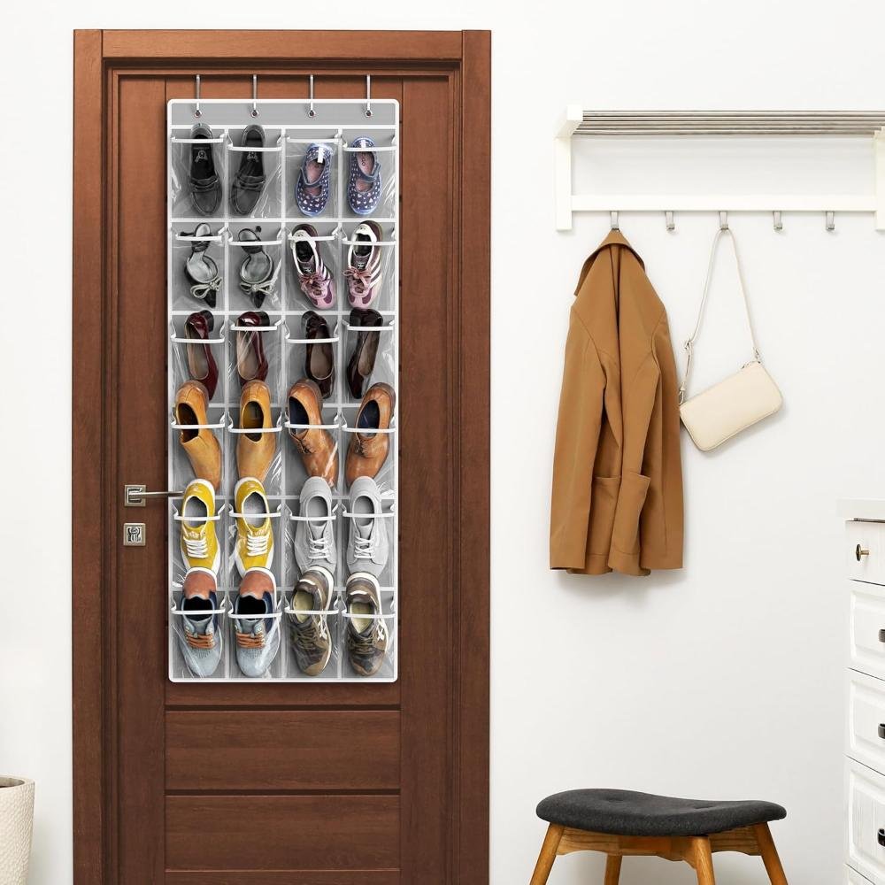 Clear over-the-door shoe organizer with 24 mesh pockets holding sneakers and shoes on wooden door