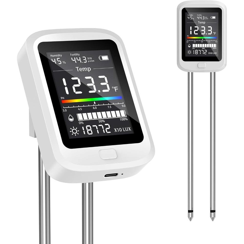 White digital plant monitor with large LCD screen displaying temperature, humidity, fertility, pH levels, moisture percentage, and light intensity with dual probes
