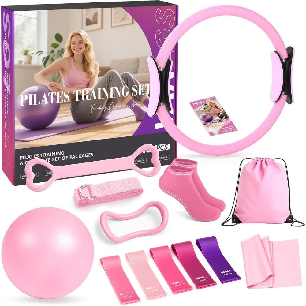 Pink 11-piece Pilates training set including resistance ring, exercise ball, loop bands, yoga strap, Pilates socks, carrying bag, and workout guide in retail packaging