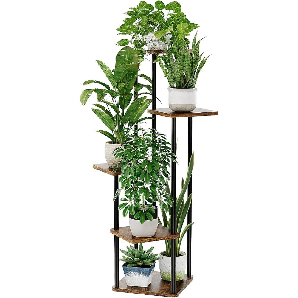Four-tier vertical plant stand with wooden shelves and black metal frame displaying pothos, bird of paradise, snake plant, prayer plant, and succulents