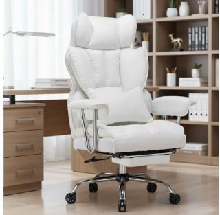 White ergonomic executive office chair with high back support, retractable footrest, lumbar cushion, and chrome rolling base in modern home office