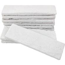 White faux brick wall panels stack showing textured surface for DIY accent walls and home décor