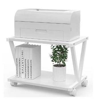White two-tier rolling printer stand cart with wheels holding white laser printer, paper, and small potted plant on lower shelf